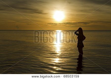 Sunrise And Traveler Sihouette