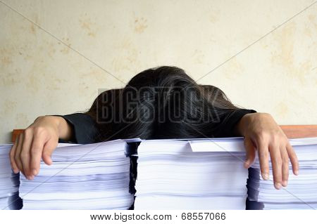 Businesswoman Tired And Sleep At Pile Of Papers