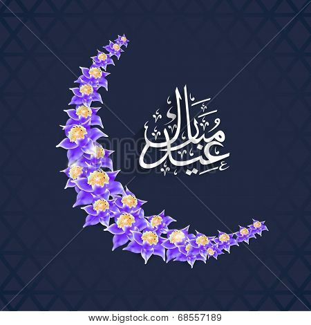 Arabic islamic calligraphy of text Eid Mubarak with crescent moon on blue background for muslim commuity festival celebrations. 