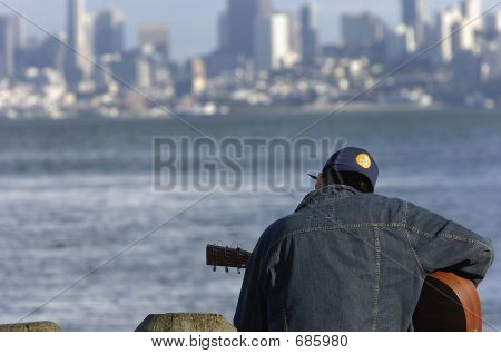 Kytarista v San Francisco Bay
