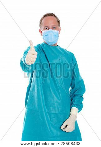 Young Doctor With Surgical Mask And Green Coat