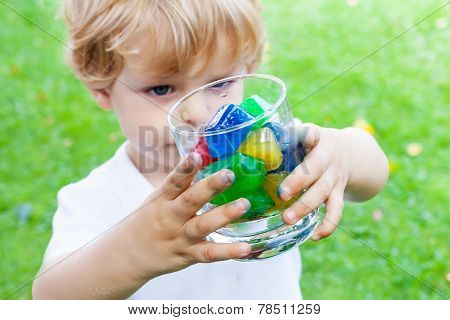 Beautiful Toddler Boy With Glass Of Berry Ice Cubes