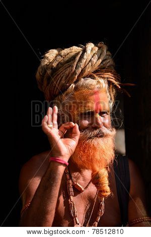 Sadhu Man With Dreadlocks And Painted Face In Pashupatinath