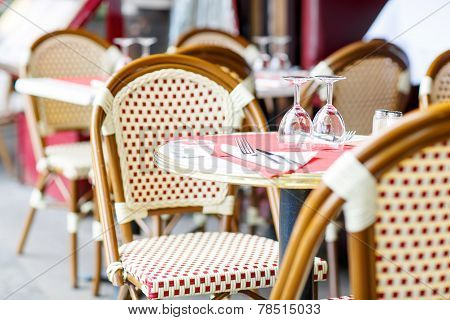 Empty Outdoor Restaurant Table In Paris, France