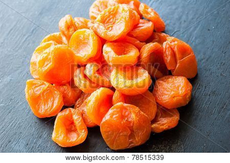 Dried Apricots On Black Background