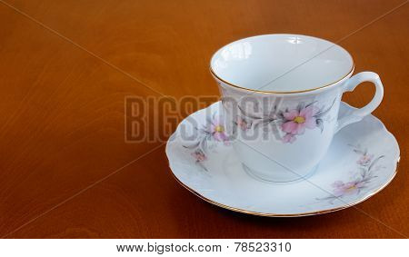 Empty Cup And Sauser