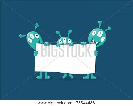 Aliens with a blank sign