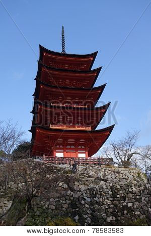 Miyajima Pagoda Located On The Red Hills Of The Island Of Miyajima.