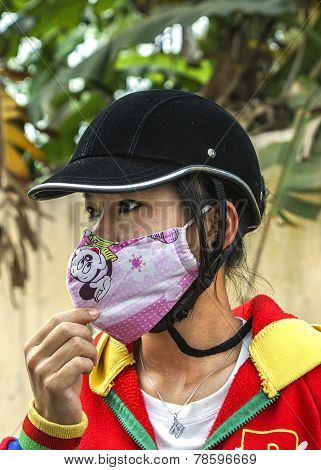 Young Vietnamese Women With Face Covering Mask.