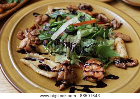 Plate Of Salad With Quid