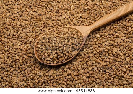 buckwheat in a wooden spoon