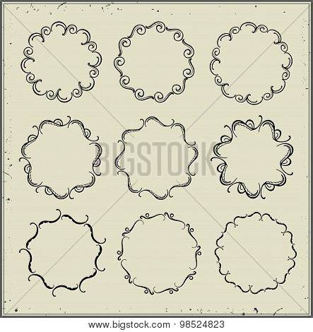 Set of black ornate frames.