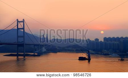 Hong Kong bridge, buildings, lake and boat