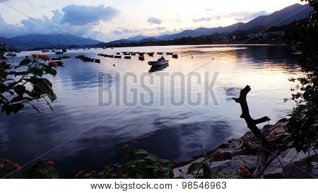 fishing boats on the lake