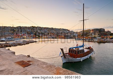 Sail boat in Mikrolimano marina.