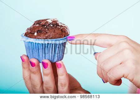 Sweet Chocolate Muffin Human Hands. Confectionery.