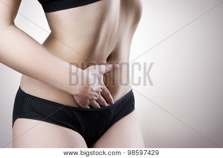 Woman With Abdominal Pain. Pain In The Human Body