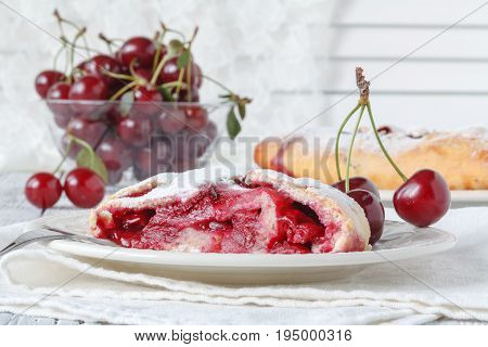 Tasty Cherry Pie On Plates, Placed On Wooden Table