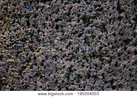Red Purple Old Laterite Stone texture close up