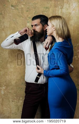 Girl With Glass Holding Man Drinking Wine From Bottle