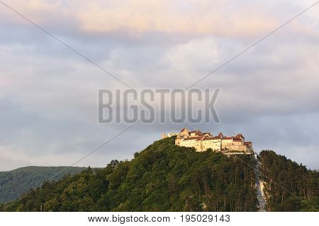 Sunset At Rasnov Citadel (romanian: Cetatea Rasnov, German: Rosenauer Burg) Is A Historic Monument A