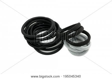 Pieces of hair elastics to tie hair. Rubber head dressing in Black Grey on white background