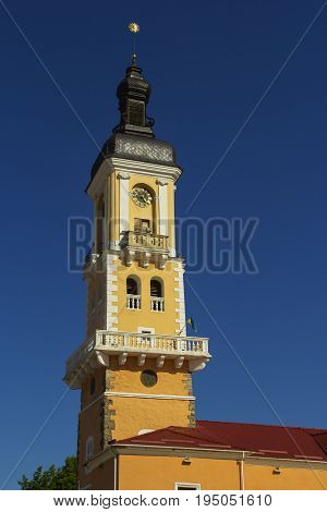 City hall of Kamyanets-Podilsky over blue sky Ukraine