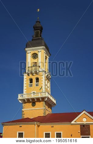 City hall of Kamyanets-Podilsky over blue sky Ukraine
