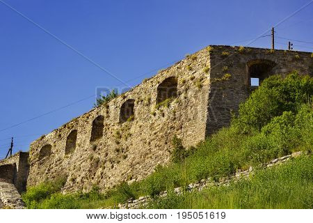 Ancient fortification wall of the castle in Kamyanets Podilsky Ukraine