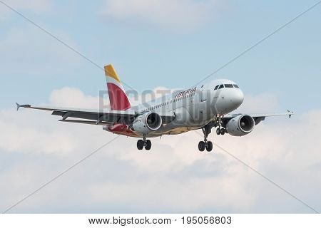 London UK - July 9 2017: Plane Airbus A319 Iberia Airlines landing at London Heathrow Airport