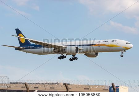 LONDON UK - JULY 9 2017: Plane Boeing 777 Jet Airways Airlines landing at London Heathrow Airport