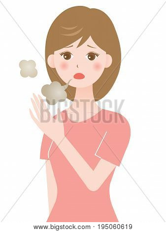 young woman checking her bad breath with her hand