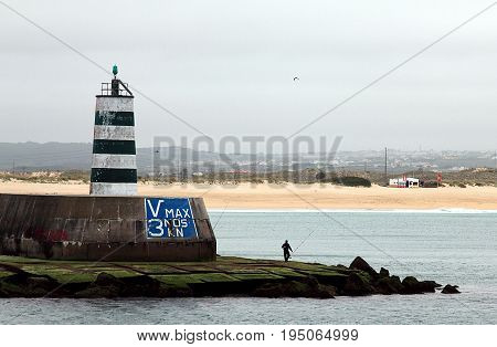 Old pier lighthouse in Fortaleza de Peniche (Fort of Peniche), Portugal