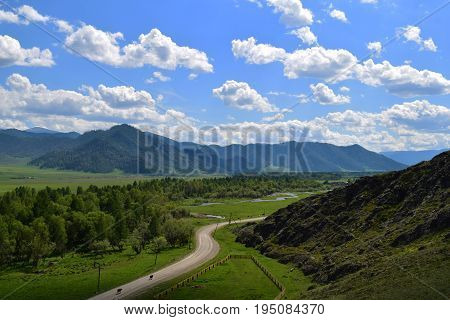 Road near village in Altai mountains. Altay Republic Siberia Russia.