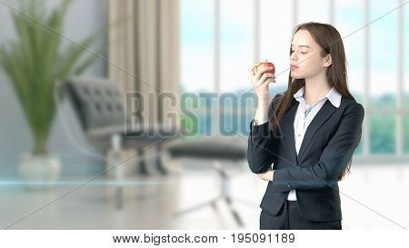 Young Beautiful Business Woman And Creative Designer Standing Over Blured Interior Background