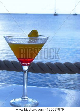 Sex on the Beach Cocktail with Blue Background