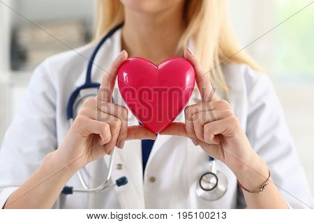 Female Medicine Doctor Hands Holding Red Heart