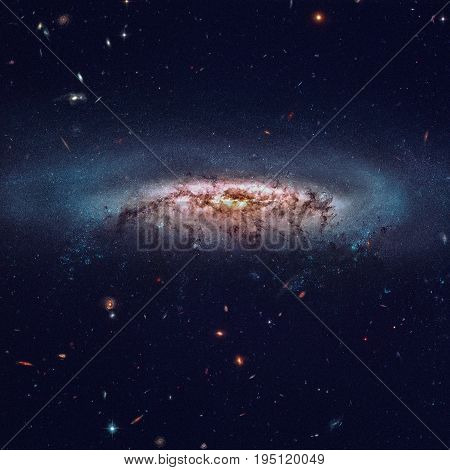 NGC 4522 is a barred spiral galaxy in the constellation Virgo. Retouched image. Elements of this image furnished by NASA.
