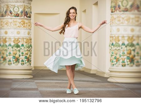 Smiling Beautiful Young Woman Posing Outdoors