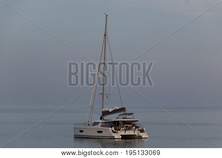 Group of blue fishing boats moored in a harbor