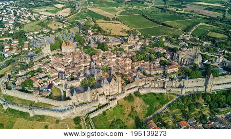 Aerial top view of Carcassonne medieval city and fortress castle from above, Sourthern France