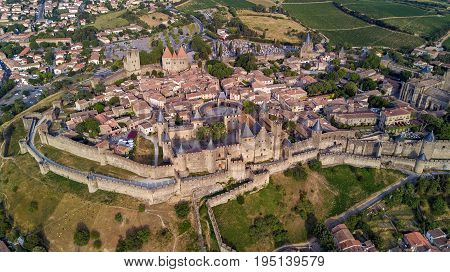 Aerial top view of Carcassonne medieval city and fortress castle from above, Sourthern France