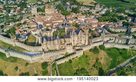 Aerial top view of Carcassonne medieval city and fortress castle from above, Sourthern France