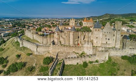 Aerial top view of Carcassonne medieval city and fortress castle from above, Sourthern France