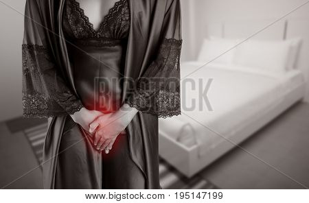 The woman in purple satin sleepwear and robe wake up for go to restroom. People with urinary bladder problem concept