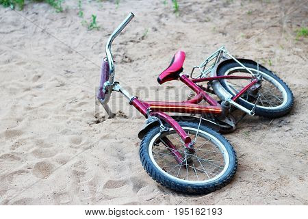 At The End Of A Journey. Bicycle Lying On The Beach.