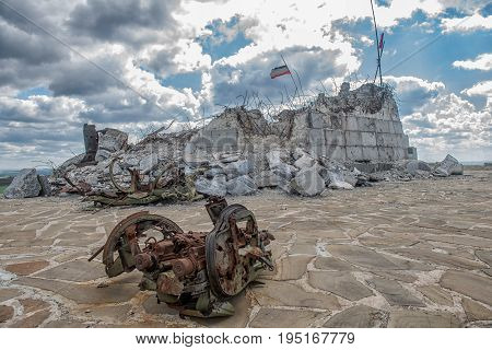 Monument to Soviet soldiers piled rubble destroyed after the hostilities of 2014. DNR Ukraine Saur-Tomb.