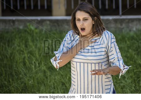 girl searching help while she's choking during feeding