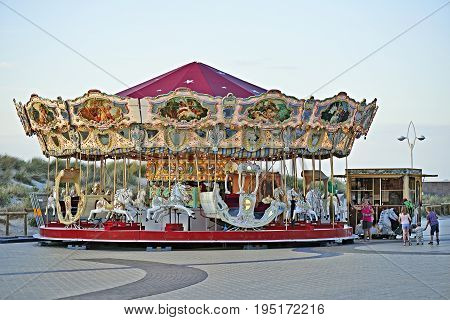 Merry-go-round On Belgian Seaside