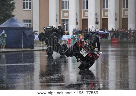 Russia, the city of Novokuibyshevsk, June 24, 2017, Technopark-2017 festival, rain and cars